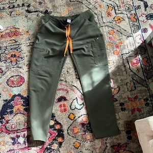 Figs scrub bottoms. Yola skinny Small petite. Olive green with orange tie.